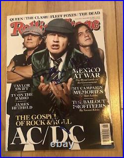 AC/DC autographed rolling stone magazine