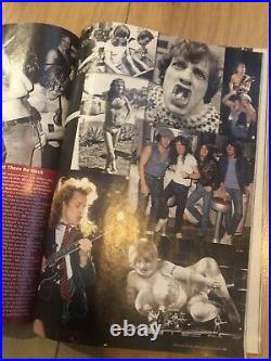 AC/DC autographed rolling stone magazine