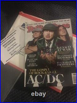 AC/DC autographed rolling stone magazine