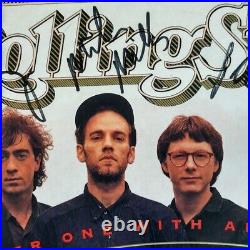 Autographs of band REM Members on Cover of Rolling Stones Autographs of band REM Members on Cover of Rolling Stones