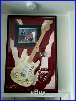 Guitar Autographed By Rolling Stones With Authenticated Certificate