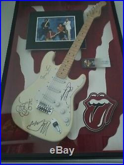 Guitar Autographed By Rolling Stones With Authenticated Certificate
