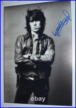 Keith Richards signed The Rolling Stones photo 11 x 14 with REAL Epperson COA Keith Richards signed The Rolling Stones photo 11 x 14 with REAL Epperson COA