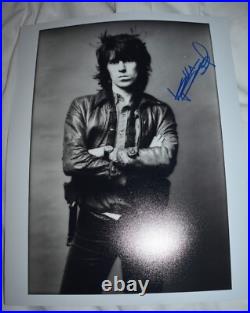 Keith Richards signed The Rolling Stones photo 11 x 14 with REAL Epperson COA Keith Richards signed The Rolling Stones photo 11 x 14 with REAL Epperson COA