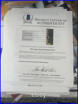Mick Jagger Signed Small Newspaper Cut Beckett LOA Rolling Stones