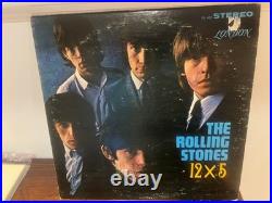 Rolling Stones 12x5 Signed Jagger Richards Jones Watts Wyman