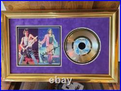 Rolling Stones Autographed Mick Jager And Keith Richard's Picture And Gold Album