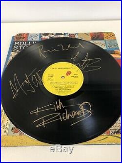 Rolling Stones Autographs Signed LP With COA. Mick Jagger, Wood, Richards, Watts