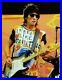 Ron-Wood-Signed-Autographed-11X14-Photo-Rolling-Stones-Playing-Guitar-GV834854-01-fpl