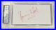 Ronnie-Wood-Rolling-Stones-Signed-4x6-Cut-Nice-Red-Ink-Autograph-PSA-DNA-01-dy
