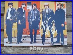 THE ROLLING STONES BAND SIGNED 8X11 PHOTO. Certified. Numbered. GENUINE