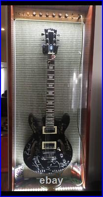 The Rolling Stones & ACDC hand signed guitar with COA The Rolling Stones & ACDC hand signed guitar with COA