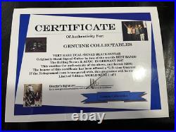 The Rolling Stones & ACDC hand signed guitar with COA The Rolling Stones & ACDC hand signed guitar with COA