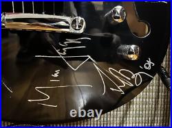 The Rolling Stones & ACDC hand signed guitar with COA The Rolling Stones & ACDC hand signed guitar with COA