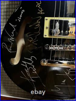 The Rolling Stones & ACDC hand signed guitar with COA The Rolling Stones & ACDC hand signed guitar with COA