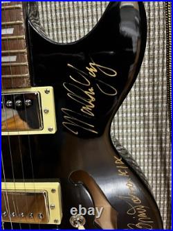 The Rolling Stones & ACDC hand signed guitar with COA The Rolling Stones & ACDC hand signed guitar with COA