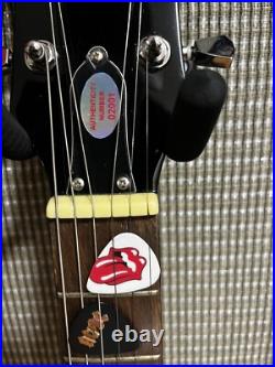 The Rolling Stones & ACDC hand signed guitar with COA The Rolling Stones & ACDC hand signed guitar with COA