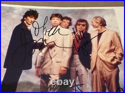 The Rolling Stones Hand Signed 10 x 8 Photo with Bonus Concert Programmes