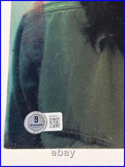 The Rolling Stones Ronnie Wood Signed 12 x 12 Program Page (Beckett/BAS)