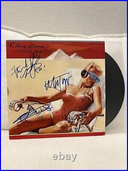 The Rolling Stones Signed Vinyl Album with COA (Jagger, Richards, Watts, Wood)