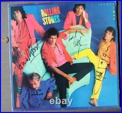 The Rolling Stones signed / autographed 1986 Dirty Work album FOUR SIGNATURES